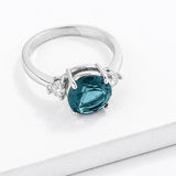 Exquisite Blue Green Three Stone CZ Engagement Ring